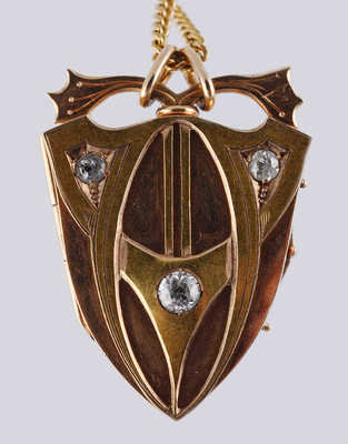 Медальон с бриллиантами и цепью из золота 56 пробы общим весом 19,83 грамма